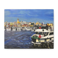 Cityscape with boats on a body of water