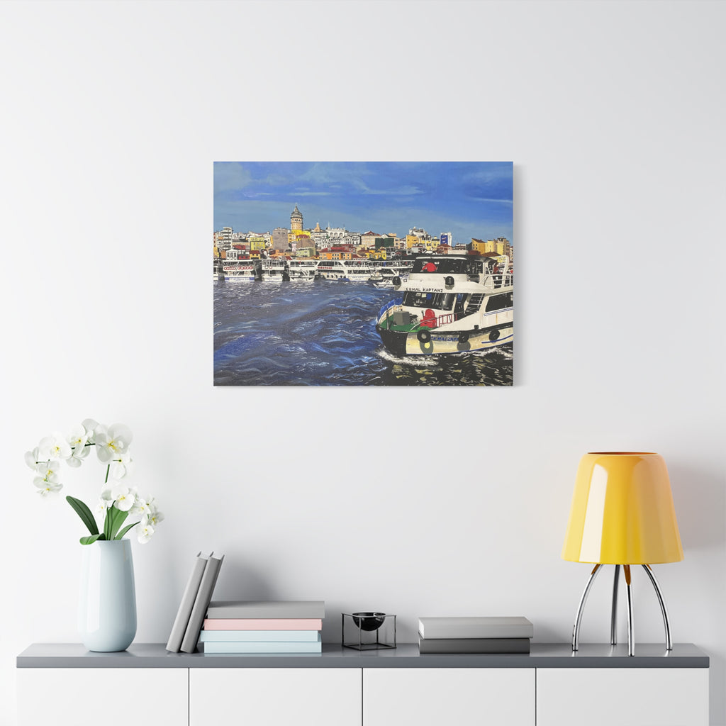 Cityscape painting on a wall above a table with decor items