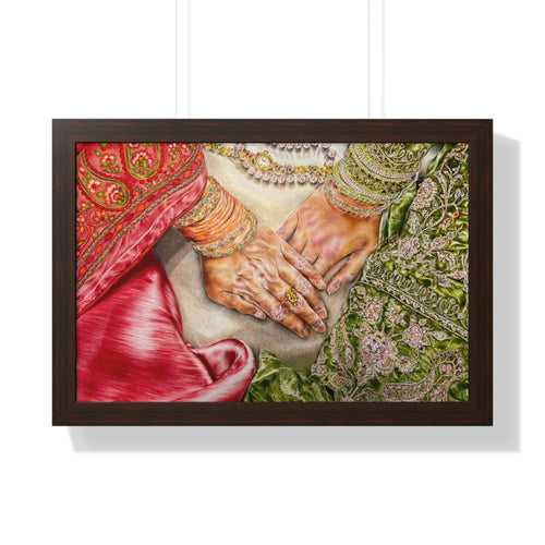 Framed artwork of two hands intertwined with intricate jewelry and traditional clothing.